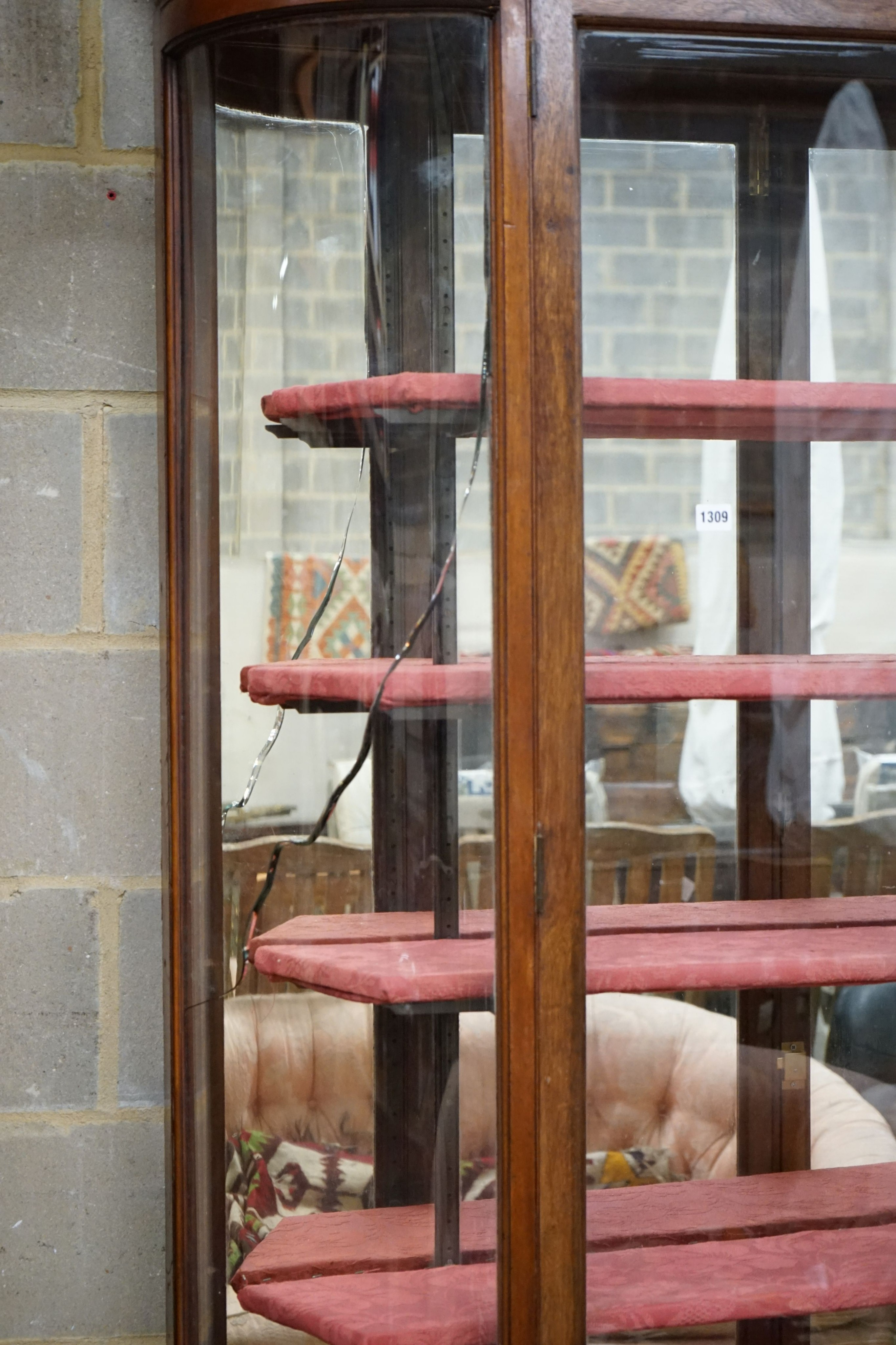 A Victorian mahogany shop display cabinet on later base, width 150cm, depth 32cm, height 209cm